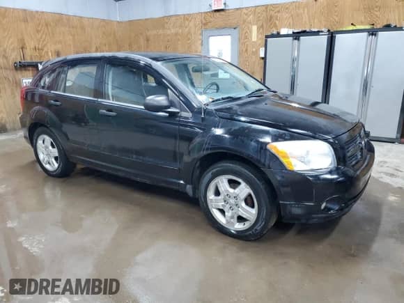 2007 Dodge Caliber SXT with VIN 1B3HB48B77D235493, listed as a Copart auction lot 90037085 with 190,855 mi miles and Clean title. Bid and sale history available at DreamBid. Image 4.