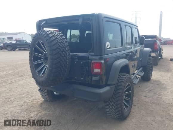 2021 Jeep Wrangler Unlimited 80th Anniversary with VIN 1C4HJXDG6MW662281, listed as a IAAI auction lot 43194178 with 52,603 mi miles and . Bid and sale history available at DreamBid. Image 4.