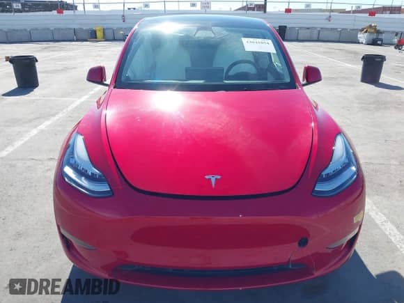 2022 Tesla Model Y Long Range z VIN 7SAYGDEE2NF352440, wystawiony jako IAAI lot #43041054 z przebiegiem 46 950 mil mil oraz . Historia ofert i sprzedaży dostępna na DreamBid. Obrazek 10.