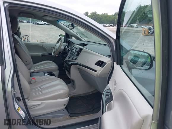 2012 Toyota Sienna LE with VIN 5TDJK3DC1CS032185, listed as a IAAI auction lot 42322793 with 142,139 mi miles and . Bid and sale history available at DreamBid. Image 5.