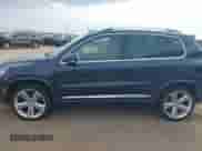 2015 Volkswagen Tiguan S with VIN WVGAV7AX7FW093868, listed as a IAAI auction lot 43143969 with 116,252 mi miles and . Bid and sale history available at DreamBid. Image 14.