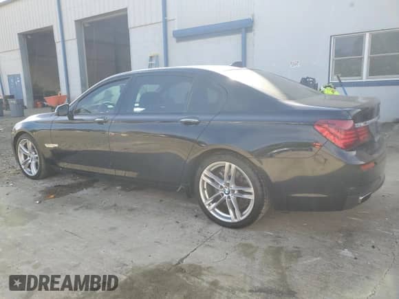 2015 BMW 7 Series 750Li with VIN WBAYE8C5XFD780923, listed as a Copart auction lot 85478625 with 164,240 mi miles and Salvage title. Bid and sale history available at DreamBid. Image 2.