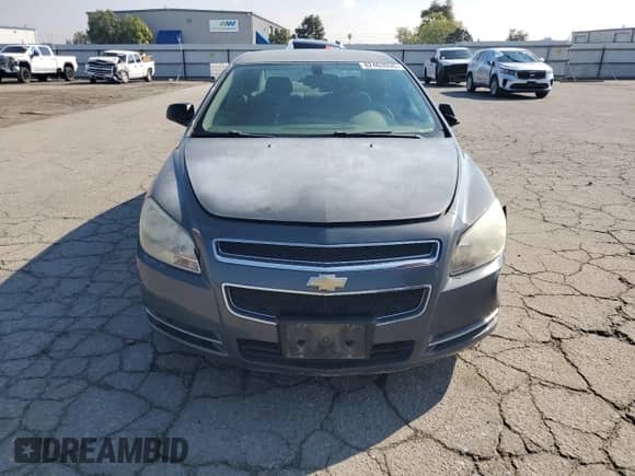 2009 Chevrolet Malibu 1LS with VIN 1G1ZG57B79F149967, listed as a Copart auction lot 82463935 with Not provided miles and Salvage title. Bid and sale history available at DreamBid. Image 5.