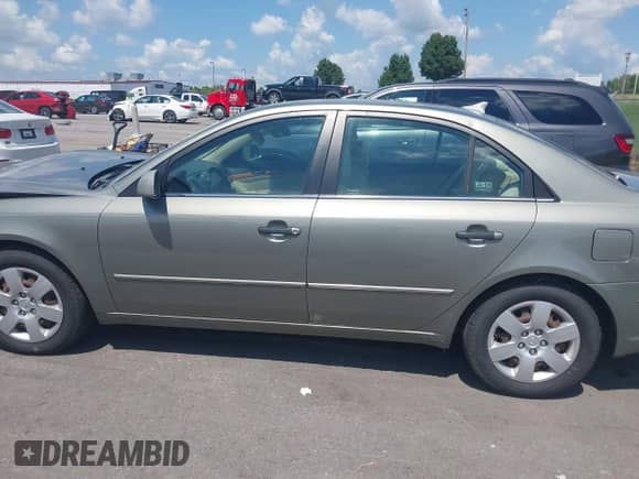 2009 Hyundai Sonata GLS z VIN 5NPET46F49H407514, wystawiony jako IAAI lot #42972653 z przebiegiem 230 843 mil mil oraz . Historia ofert i sprzedaży dostępna na DreamBid. Obrazek 14.