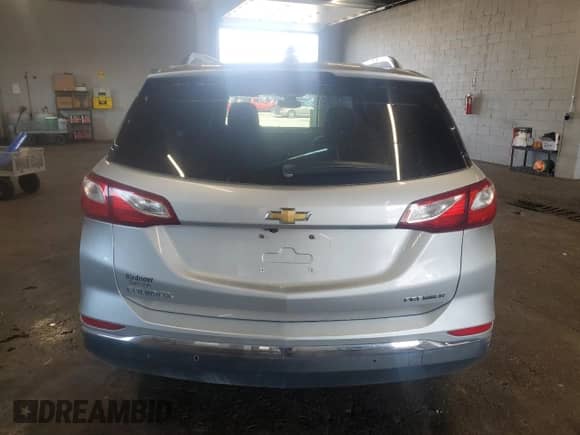 2020 Chevrolet Equinox Premier with VIN 3GNAXNEV2LS527009, listed as a Copart auction lot 64666645 with 33,470 mi miles and Salvage title. Bid and sale history available at DreamBid. Image 6.