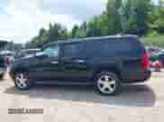 2012 Chevrolet Suburban LT z VIN 1GNSKJE7XCR117879, wystawiony jako IAAI lot #43005567 z przebiegiem 166 242 mil mil oraz . Historia ofert i sprzedaży dostępna na DreamBid. Obrazek 14.