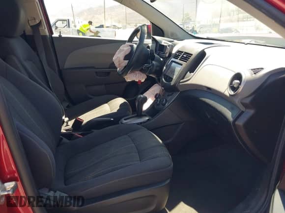 2015 Chevrolet Sonic LT with VIN 1G1JC6SGXF4108113, listed as a IAAI auction lot 42709302 with 82,024 mi miles and . Bid and sale history available at DreamBid. Image 5.