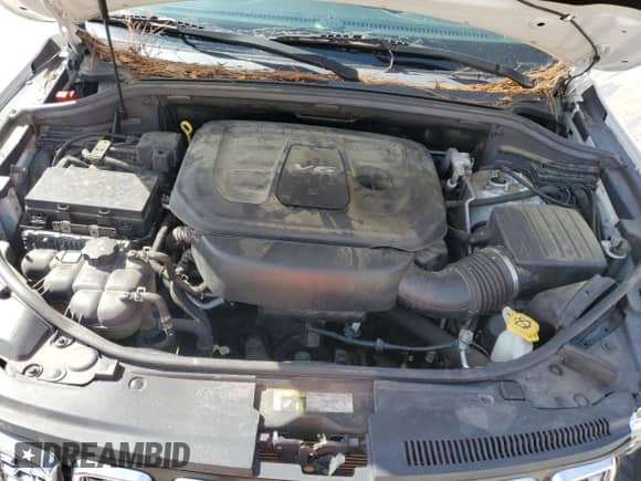 2017 Jeep Grand Cherokee Overland with VIN 1C4RJFCGXHC964499, listed as a Copart auction lot 71671795 with 117,302 mi miles and Salvage title. Bid and sale history available at DreamBid. Image 12.