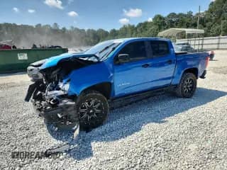 2022 Chevrolet Colorado 4WD Z71 with VIN 1GCGTDEN9N1162227, listed as a Copart auction lot 70826215 with 24,142 mi miles and Salvage title. Bid and sale history available at DreamBid. Image 1.