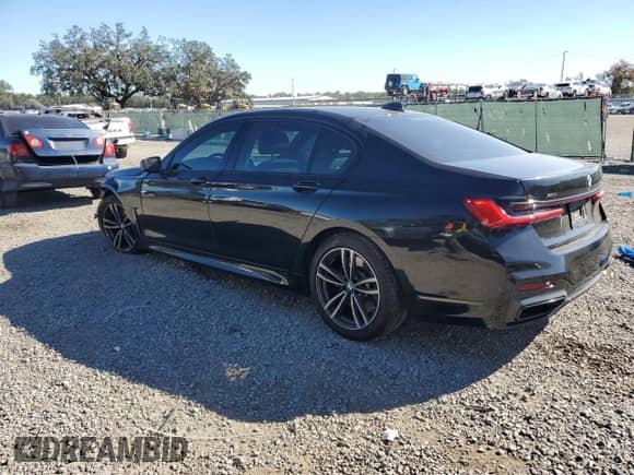 2022 BMW 7 Series 750i xDrive with VIN WBA7U2C05NCH77127, listed as a Copart auction lot 83849074 with 35,079 mi miles and Salvage title. Bid and sale history available at DreamBid. Image 2.