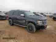 2013 Chevrolet Tahoe LT with VIN 1GNSCBE00DR359815, listed as a Copart auction lot 69586395 with 148,444 mi miles and Salvage title. Bid and sale history available at DreamBid. Image 4.