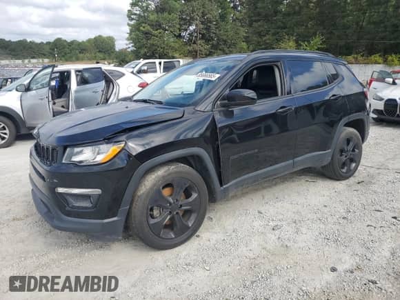 2019 Jeep Compass Altitude with VIN 3C4NJCBB5KT676730, listed as a Copart auction lot 85666565 with 123,853 mi miles and Clean title. Bid and sale history available at DreamBid. Image 1.