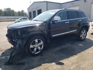 2013 Jeep Grand Cherokee Limited с VIN 1C4RJFBG5DC633776, выставлен на аукционе Copart как лот 80206735 с пробегом 170 991 миль миль и Списание • Salvage title. История ставок и продаж доступна на DreamBid. Изображение 1.