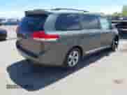 2012 Toyota Sienna LE AAS with VIN 5TDKK3DC3CS185395, listed as a IAAI auction lot 42136801 with 120,322 mi miles and . Bid and sale history available at DreamBid. Image 4.