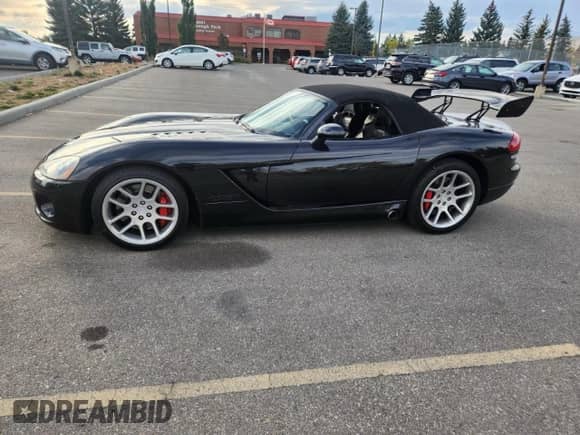 2005 Dodge Viper SRT-10 with VIN 1B3JZ65Z95V500299, listed as a Copart auction lot 84073595 with 34,364 mi miles and Clean title. Bid and sale history available at DreamBid. Image 12.