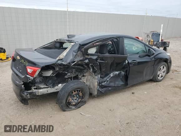 2017 Chevrolet Cruze LS with VIN 1G1BC5SMXH7120252, listed as a Copart auction lot 70664335 with 143,503 mi miles and Salvage title. Bid and sale history available at DreamBid. Image 3.