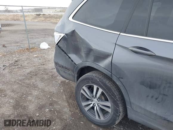 2018 Honda Pilot EX-L with VIN 5FNYF6H75JB012945, listed as a IAAI auction lot 41167606 with 73,430 mi miles and . Bid and sale history available at DreamBid. Image 17.