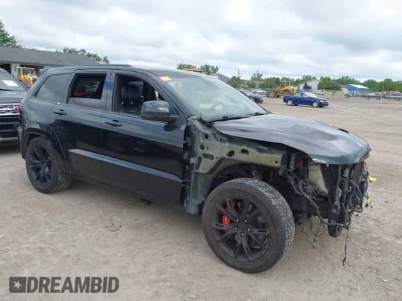 2015 Jeep Grand Cherokee SRT with VIN 1C4RJFDJ8FC768262, listed as a IAAI auction lot 42739805 with 86,840 mi miles and . Bid and sale history available at DreamBid. Image 1.