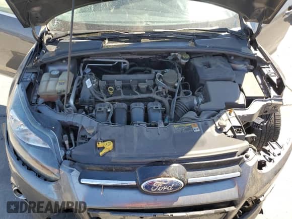 2012 Ford Focus Titanium с VIN 1FAHP3J29CL268036, выставлен на аукционе Copart как лот 70782895 с пробегом 72 791 миль миль и Списание • Salvage title. История ставок и продаж доступна на DreamBid. Изображение 11.