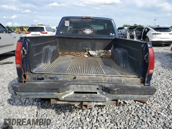 1996 GMC Sierra 1500 z VIN 1GTEC19M8TE549865, wystawiony jako Copart lot #81018355 z przebiegiem 139 943 mil mil oraz Szkoda całkowita • Salvage title. Historia ofert i sprzedaży dostępna na DreamBid. Obrazek 6.