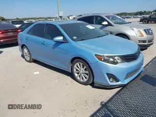 2012 Toyota Camry XLE with VIN 4T1BD1FK1CU034260, listed as a IAAI auction lot 43437430 with 245,971 mi miles and . Bid and sale history available at DreamBid. Image 1.