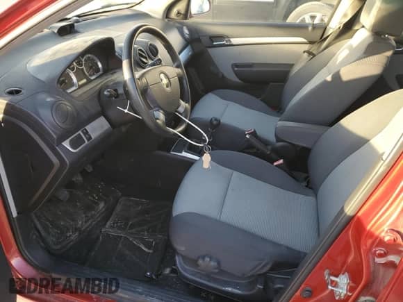 2011 Chevrolet Aveo LS z VIN KL1TD6DE6BB188130, wystawiony jako Copart lot #77906444 z przebiegiem 123 792 mil mil oraz Szkoda całkowita • Salvage title. Historia ofert i sprzedaży dostępna na DreamBid. Obrazek 7.