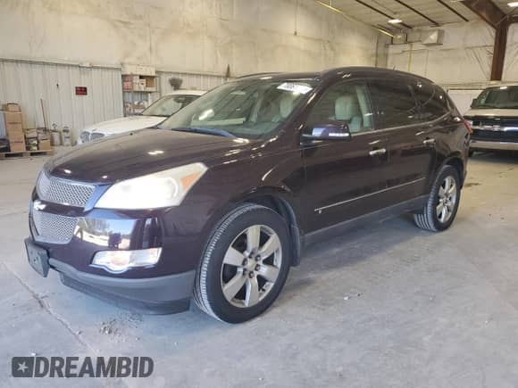 2009 Chevrolet Traverse LTZ with VIN 1GNEV33D29S132547, listed as a Copart auction lot 70061145 with 130,931 mi miles and Clean title. Bid and sale history available at DreamBid. Image 1.