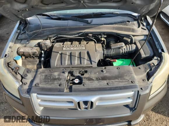 2007 Honda Pilot LX с VIN 2HKYF18177H500576, выставлен на аукционе Copart как лот 69687025 с пробегом 165 951 миль миль и Списание • Salvage title. История ставок и продаж доступна на DreamBid. Изображение 12.