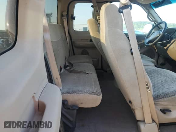 2000 Ford F-150 XL z VIN 1FTRX17W1YKA61098, wystawiony jako Copart lot #66581345 z przebiegiem Nie podano mil oraz Szkoda całkowita • Salvage title. Historia ofert i sprzedaży dostępna na DreamBid. Obrazek 10.