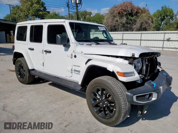 2022 Jeep Wrangler Unlimited Sahara with VIN 1C4JJXP67NW212029, listed as a Copart auction lot 68147625 with 24,347 mi miles and Salvage title. Bid and sale history available at DreamBid. Image 4.