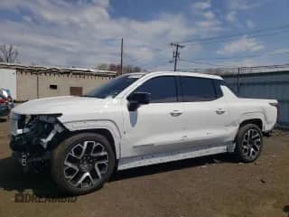 2024 Chevrolet Silverado EV RST с VIN 1GC40ZEL9RU301932, выставлен на аукционе Copart как лот 54297145 с пробегом 5 502 миль миль и Списание • Salvage title. История ставок и продаж доступна на DreamBid. Изображение 1.