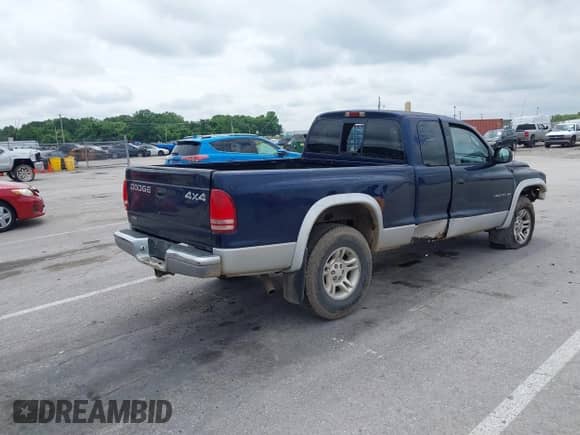 2001 Dodge Dakota Sport with VIN 1B7GG22N51S115469, listed as a IAAI auction lot 42463377 with 211,695 mi miles and . Bid and sale history available at DreamBid. Image 4.
