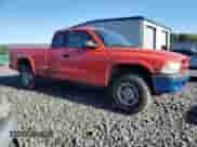 2000 Dodge Dakota Sport with VIN 1B7GG22N8YS574148, listed as a Copart auction lot 85686905 with 124,245 mi miles and Salvage title. Bid and sale history available at DreamBid. Image 4.