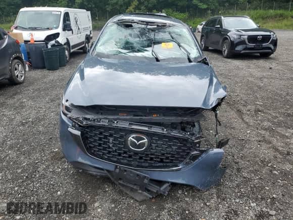 2023 Mazda CX-5 S Preferred z VIN JM3KFBCM5P0199095, wystawiony jako Copart lot #67264225 z przebiegiem 7 969 mil mil oraz Szkoda całkowita • Salvage title. Historia ofert i sprzedaży dostępna na DreamBid. Obrazek 5.
