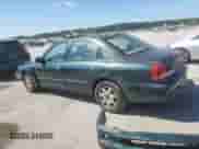 2001 Hyundai Sonata GLS z VIN KMHWF35V11A485934, wystawiony jako Copart lot #69853585 z przebiegiem 120 924 mil mil oraz Szkoda całkowita • Salvage title. Historia ofert i sprzedaży dostępna na DreamBid. Obrazek 2.