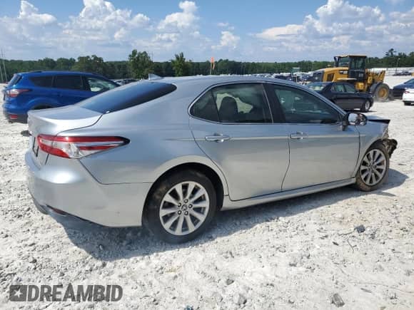 2019 Toyota Camry LE с VIN 4T1B11HKXKU193153, выставлен на аукционе Copart как лот 66660725 с пробегом 130 057 миль миль и Списание • Salvage title. История ставок и продаж доступна на DreamBid. Изображение 3.