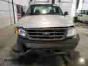 2003 Ford F-150 XL z VIN 1FTRF18273NB92414, wystawiony jako Copart lot #71539794 z przebiegiem Nie podano mil oraz Szkoda całkowita • Salvage title. Historia ofert i sprzedaży dostępna na DreamBid. Obrazek 5.