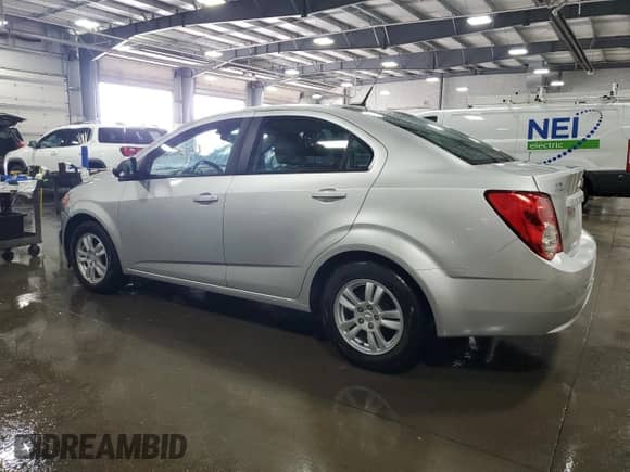 2012 Chevrolet Sonic LS с VIN 1G1JB5SH4C4212002, выставлен на аукционе Copart как лот 54702965 с пробегом 96 388 миль миль и Списание • Salvage title. История ставок и продаж доступна на DreamBid. Изображение 2.