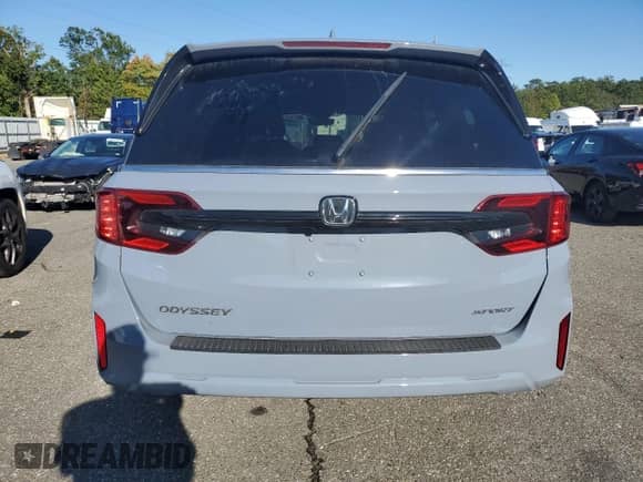 2025 Honda Odyssey Sport-L z VIN 5FNRL6H7XSB048631, wystawiony jako Copart lot #84731095 z przebiegiem 15 158 mil mil oraz Szkoda całkowita • Salvage title. Historia ofert i sprzedaży dostępna na DreamBid. Obrazek 6.