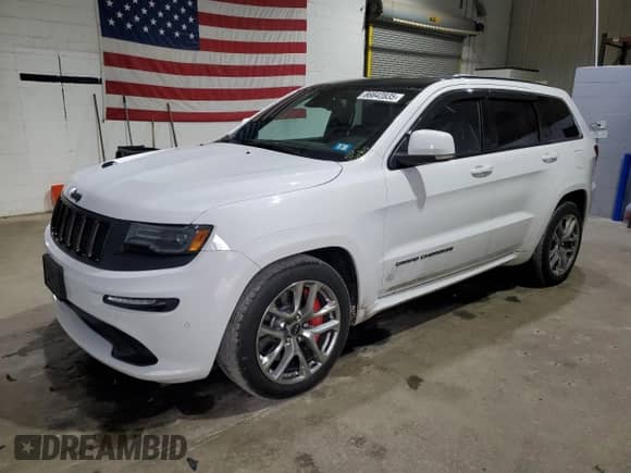 2016 Jeep Grand Cherokee SRT with VIN 1C4RJFDJ4GC503890, listed as a Copart auction lot 86642835 with 77,353 mi miles and Clean title. Bid and sale history available at DreamBid. Image 1.