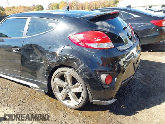2013 Hyundai Veloster Turbo с VIN KMHTC6AE8DU156928, выставлен на аукционе IAAI как лот 43471857 с пробегом 103 265 миль миль и . История ставок и продаж доступна на DreamBid. Изображение 6.
