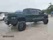 2003 Chevrolet Silverado 2500HD LT z VIN 1GCHK23U93F136457, wystawiony jako Copart lot #70617995 z przebiegiem 223 082 mil mil oraz Szkoda całkowita • Salvage title. Historia ofert i sprzedaży dostępna na DreamBid. Obrazek 3.