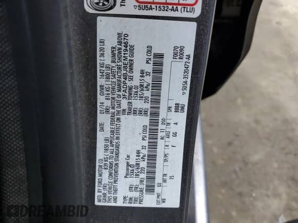 2014 Ford Fiesta SE with VIN 3FADP4BJ8EM194670, listed as a Copart auction lot 69234035 with 106,806 mi miles and Salvage title. Bid and sale history available at DreamBid. Image 12.