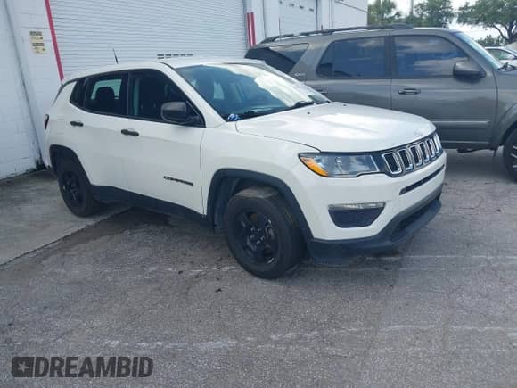 2018 Jeep Compass Sport with VIN 3C4NJCAB5JT263450, listed as a IAAI auction lot 42288257 with 115,860 mi miles and . Bid and sale history available at DreamBid. Image 1.