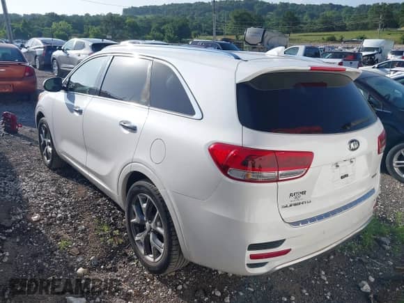 2016 Kia Sorento SXL with VIN 5XYPK4A59GG115064, listed as a IAAI auction lot 42529912 with 103,077 mi miles and . Bid and sale history available at DreamBid. Image 3.