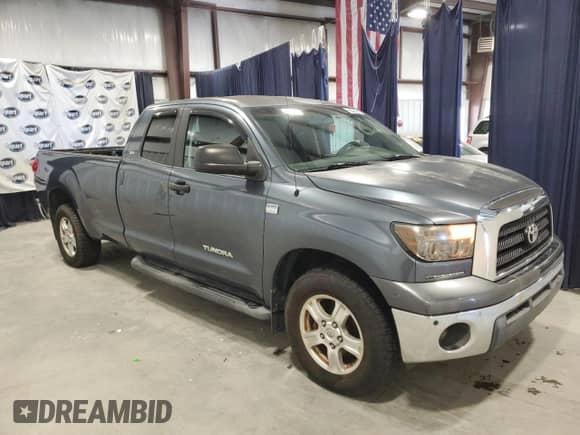 2007 Toyota Tundra SR5 with VIN 5TFST54107X001148, listed as a Copart auction lot 87414295 with 164,327 mi miles and Clean title. Bid and sale history available at DreamBid. Image 4.