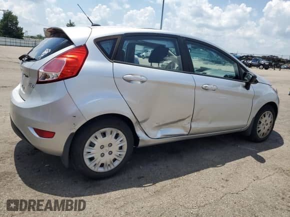 2014 Ford Fiesta S with VIN 3FADP4TJ9EM131799, listed as a Copart auction lot 62911165 with 64,732 mi miles and Salvage title. Bid and sale history available at DreamBid. Image 3.