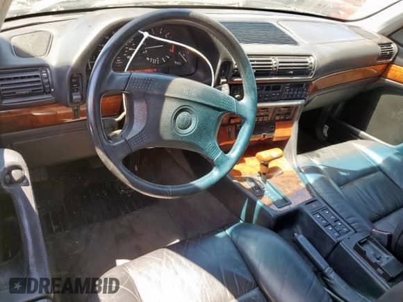 1994 BMW 7 Series с VIN WBAGD4326RDE68022, выставлен на аукционе Copart как лот 57808115 с пробегом 220 431 миль миль и Чистый • Clean title. История ставок и продаж доступна на DreamBid. Изображение 8.