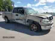 2005 Ford F-150 STX with VIN 1FTRX12W25FA37128, listed as a Copart auction lot 71256075 with 231,578 mi miles and Salvage title. Bid and sale history available at DreamBid. Image 4.