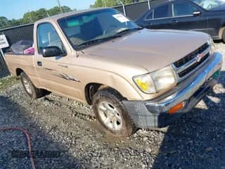 1999 Toyota Tacoma z VIN 4TANL42N5XZ542757, wystawiony jako IAAI lot #43079516 z przebiegiem 204 251 mil mil oraz . Historia ofert i sprzedaży dostępna na DreamBid. Obrazek 1.